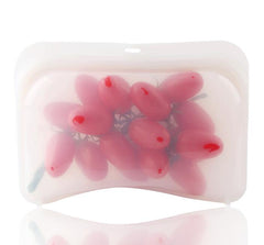 Fresh red grapes stored inside environmental protection reusable silicone food bags.