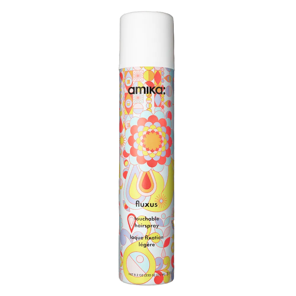 Amika Fluxus Touchable Hairspray 8oz packaging, featuring colorful design and flexible hold hairspray label.