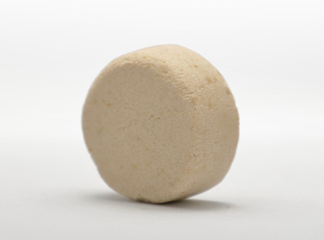 All-natural plastic-free shampoo bar for nourishing hair from roots to tips, lasting 50+ washes.