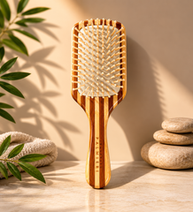 Using sustainable bamboo hairbrush for gentle hair detangling