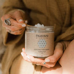 Ayurvedic coconut milk bath soak in jar, perfect for soothing and cooling summer skin irritations.