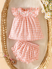 Newborn baby girl two-piece set: white cotton pleated sleeveless checkered top and matching triangular leggings