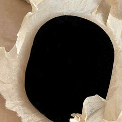 Charcoal Infused Face Sponge texture and teardrop sponge shape