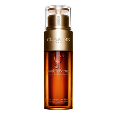 Clarins anti-aging double serum bottle with pump for smoother, firmer skin, featuring hydric and lipidic system.
