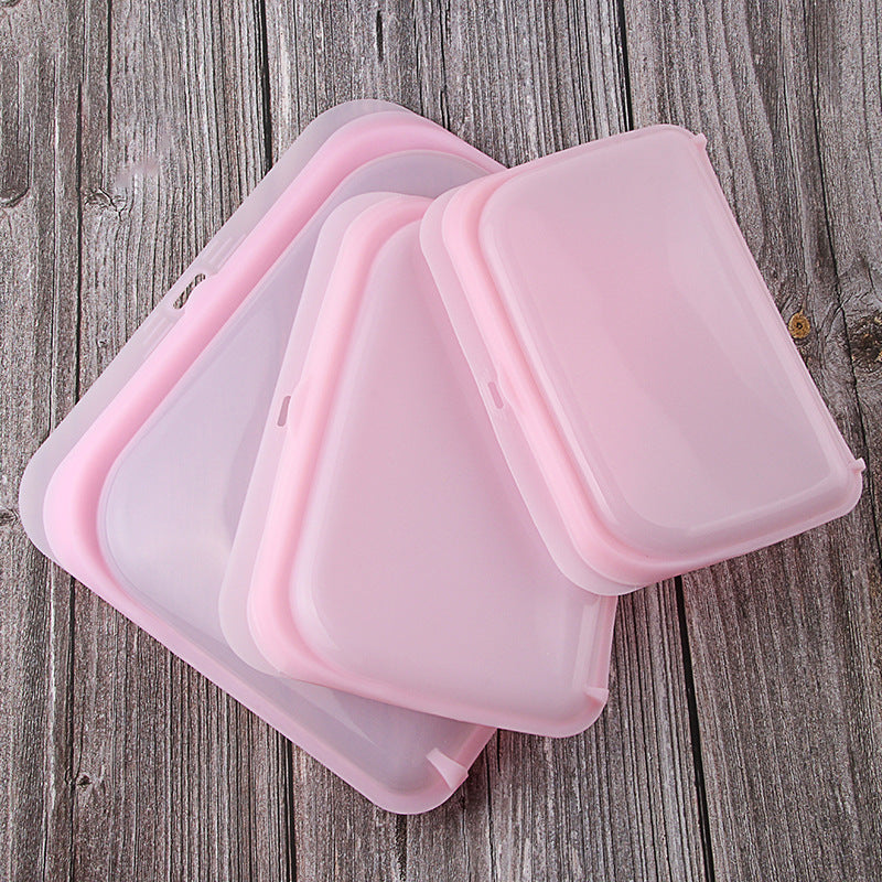 Pink food grade reusable silicone food bags for environmental protection and fresh-keeping.