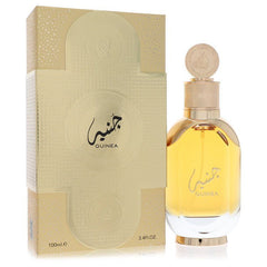 Lattafa Guinea Eau De Parfum 3.4 oz / 100 ml spray for men next to its gold decorative box.