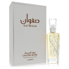 Lattafa Safwaan L'autre Musk perfume 3.4 oz (100 ml) Eau De Parfum bottle next to its white box packaging.