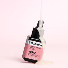 collagen firming volume serum with product dripping over bottle against pink background