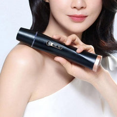 premium anti-aging cream in hand, demonstrating product usage close-up.