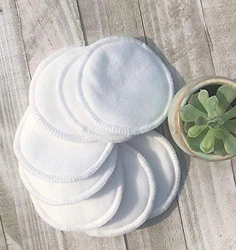 Set of reusable facial round pads included in the eco-friendly facial skincare bundle, displayed with a succulent plant.