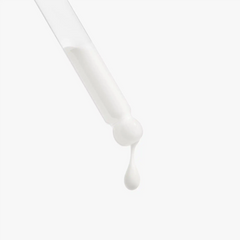 Bottle of WOW MD LLC Vitamin Glow Serum for facial care, shown with a sleek container and dropper applicator on a white background.