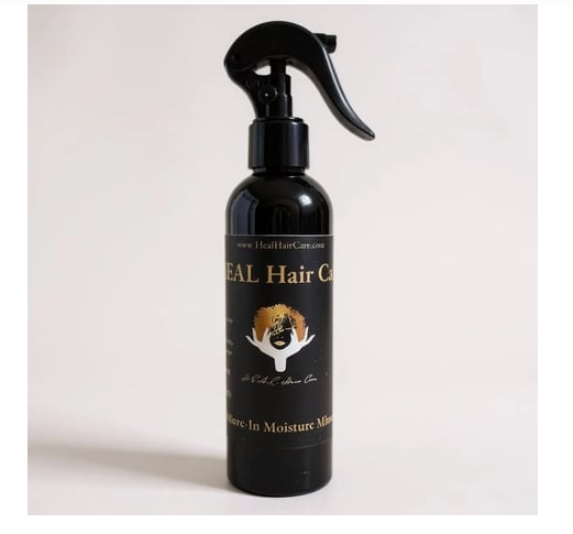 H.E.A.L. Leave-In Moisture Mist for hair hydration in a black spray bottle.