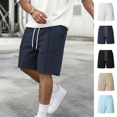 Short de sport ample à cordon pour homme