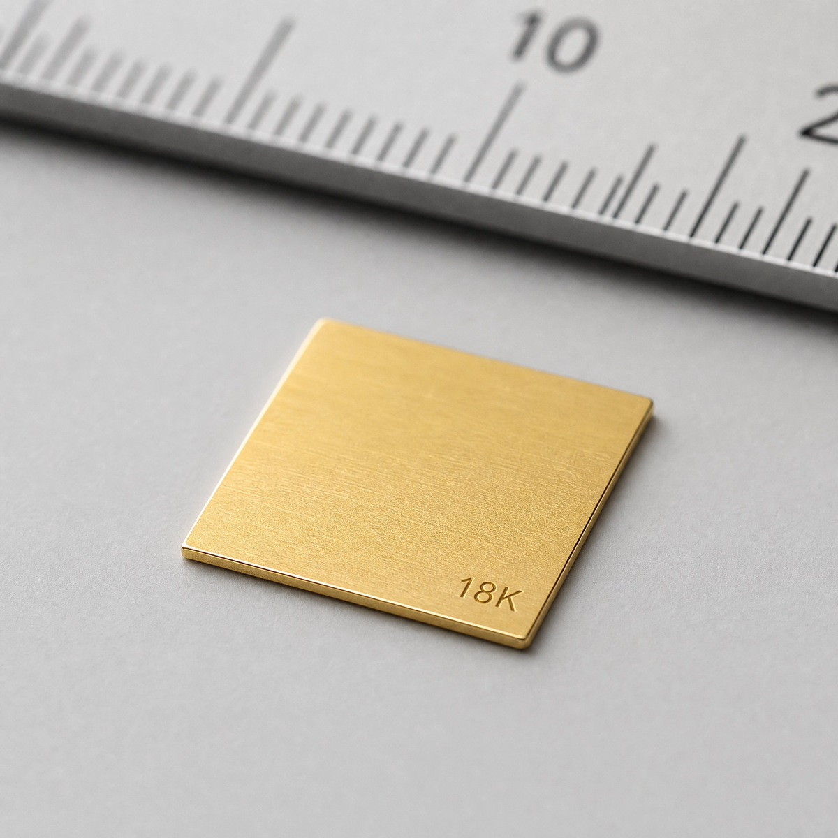 Disco de calibración de oro de ley 18K para probadores de oro