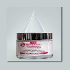 brightening face cream for radiant skin in a large 200ML jar with cream texture and silver lid on a light background.