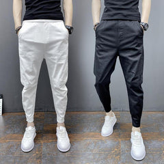 Pantalon sarouel moulant de couleur unie, longueur cheville, avec chevilles élastiques à nouer