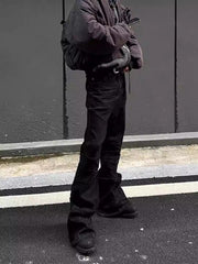 Jean en denim de style américain, coupe ajustée à bords bruts, plissé et légèrement évasé