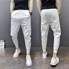 Pantalon sarouel moulant de couleur unie, longueur cheville, avec chevilles élastiques à nouer