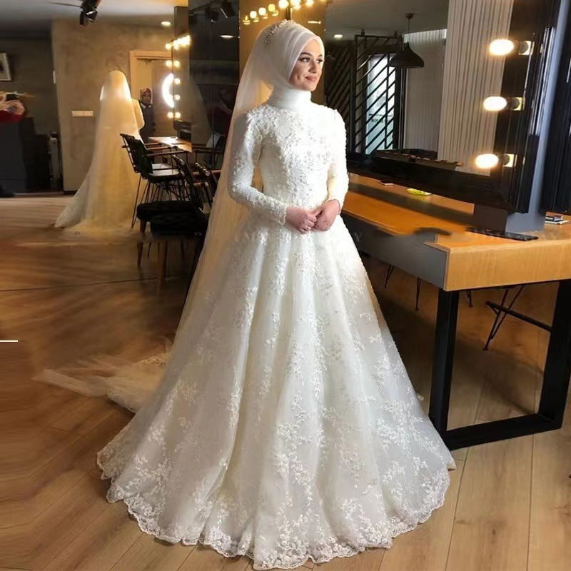 Robe de mariée blanche à manches longues et distinguée