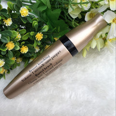 Mascara à tube doré