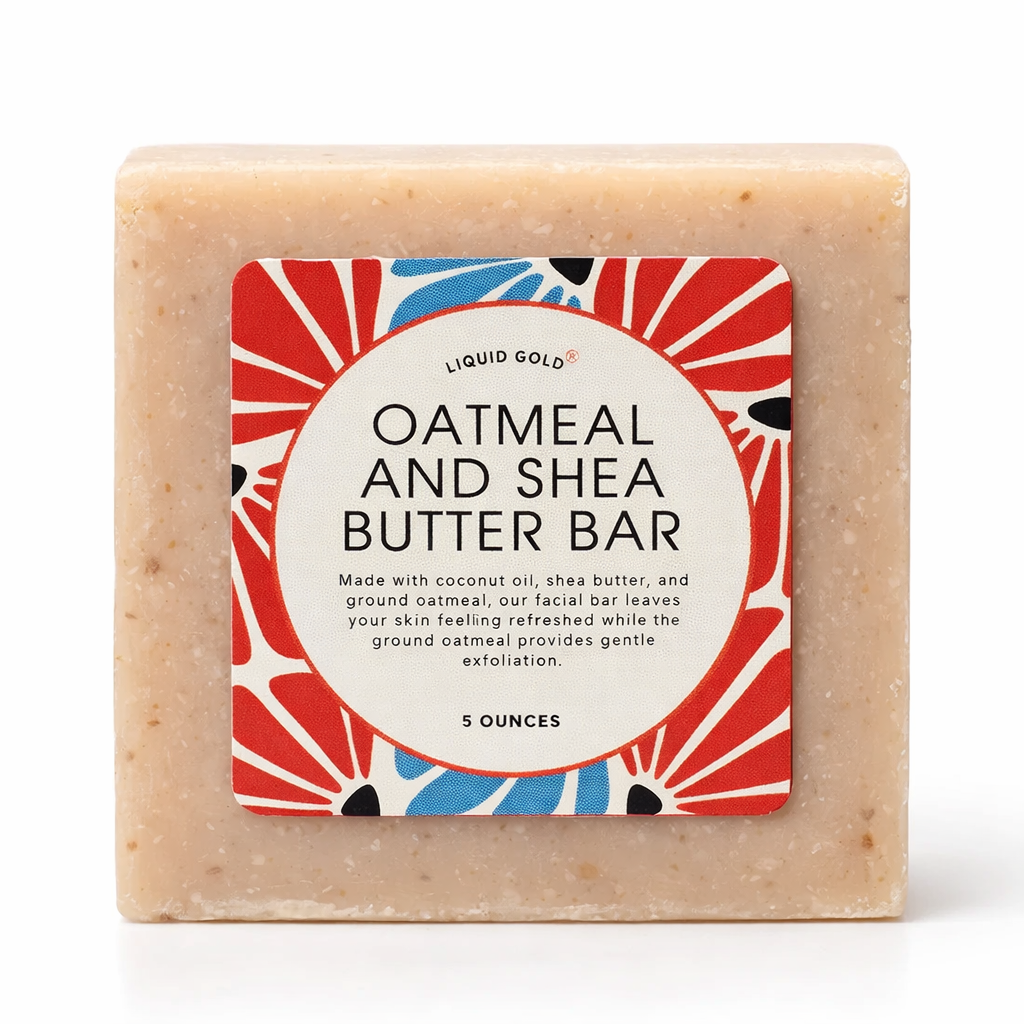 Liquid Gold hydrating shea butter and oatmeal soap bar with a red floral label.