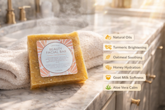 Liquid Gold turmeric honey facial bar with oatmeal on a towel, showing skin benefits like brightening and hydration.