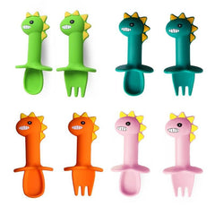 Nuevo juego de cuchara y tenedor para alimentación del bebé, corto y fácil de usar, de silicona suave con dinosaurio de dibujos animados, juguetes mordedores, vajilla de entrenamiento que no lastima
