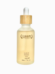 vegan glow up toner serum in a glass bottle with wooden dropper.