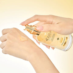 d'Alba Vita serum with vitamin capsules being applied on hand