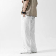 Pantalon de survêtement ample à jambes droites, avec cordon et chevilles à nouer