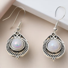 Silver Womens Drop Earrings With A Rotating Droplet Design