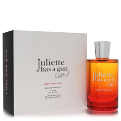 Juliette Has A Gun Lust For Sun perfume 3.3 oz Eau De Parfum spray bottle next to its white presentation box.