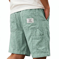 Short pour homme unicolore en lin texturé bambou, avec plusieurs poches