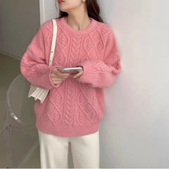 Pull épais à col rond, coupe décontractée et maille torsadée, qui met votre silhouette en valeur