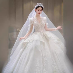 Robe de mariée à traîne, manches longues en fil principal, style rétro français sophistiqué