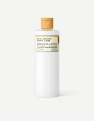 rice ceramide essence toner bottle with bright label and cap