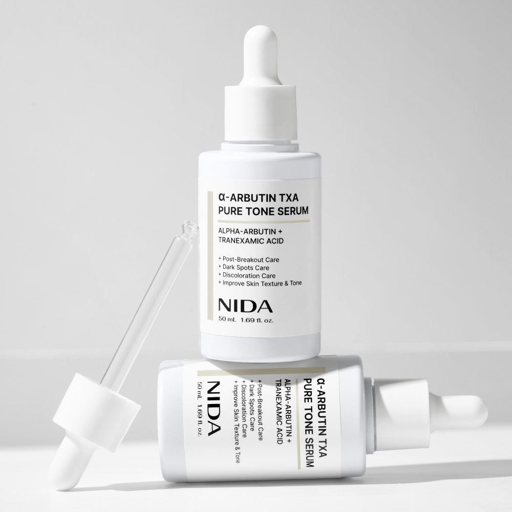α-arbutin brightening serum for even skin tone in a 50ml bottle with dropper, promoting radiant skin.