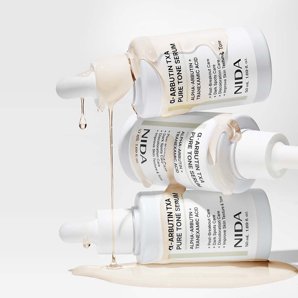 NIDA α-Arbutin TXA Pure Tone Serum 50ml, an α-arbutin brightening serum for even skin tone with smooth texture.