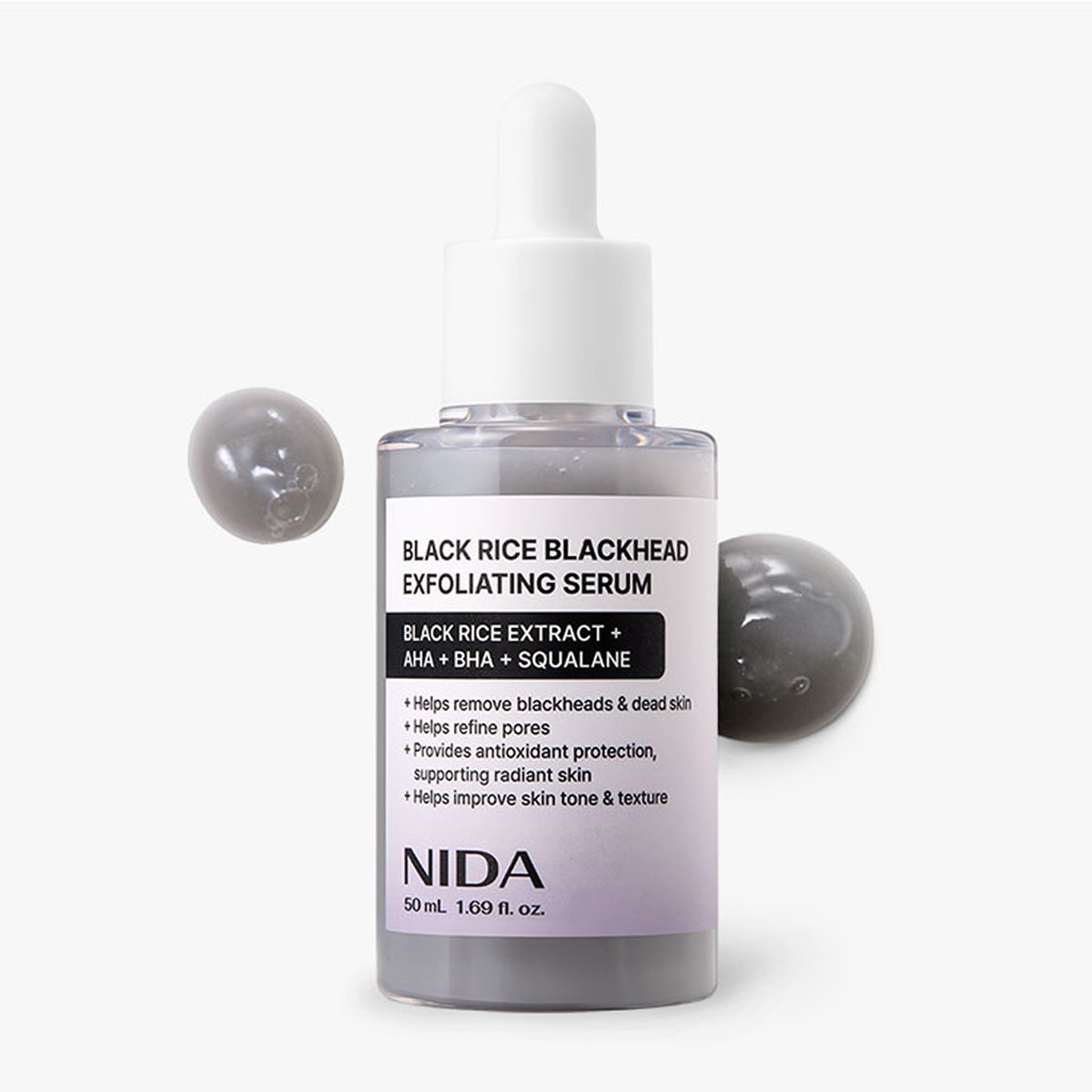 NIDA Black Rice Blackhead Exfoliating Serum 50ml with dropper and serum ball for skincare.