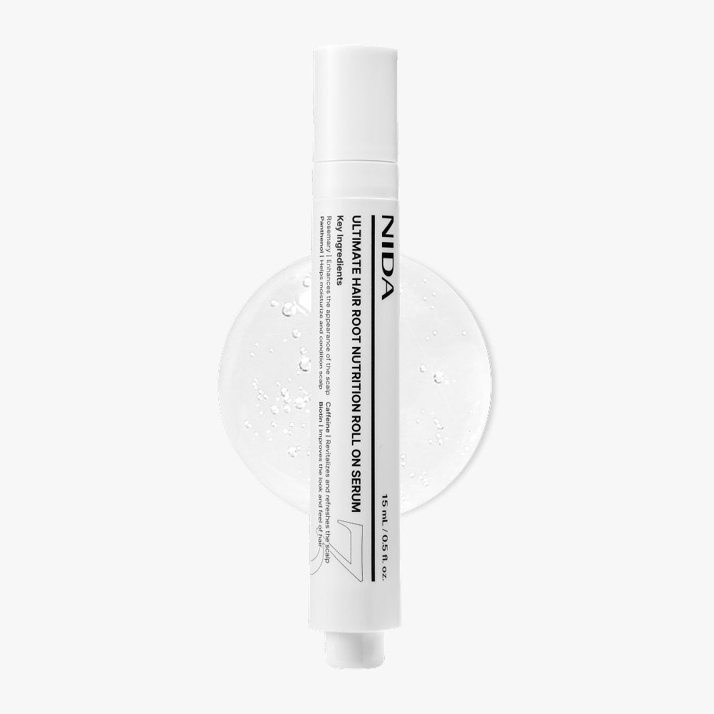 NIDA Ultimate Hair Root Nutrition Roll On Serum 15ml on a white background, offering nourishment for thicker hair.