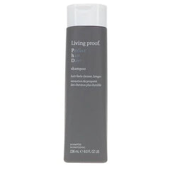 Living Proof Perfect hair Day shampoo bottle on white background.