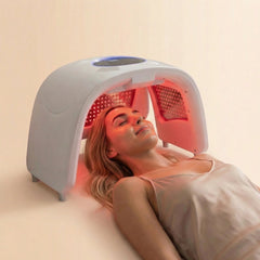 laser light therapy lamp in use by a woman for skin rejuvenation and hair restoration.