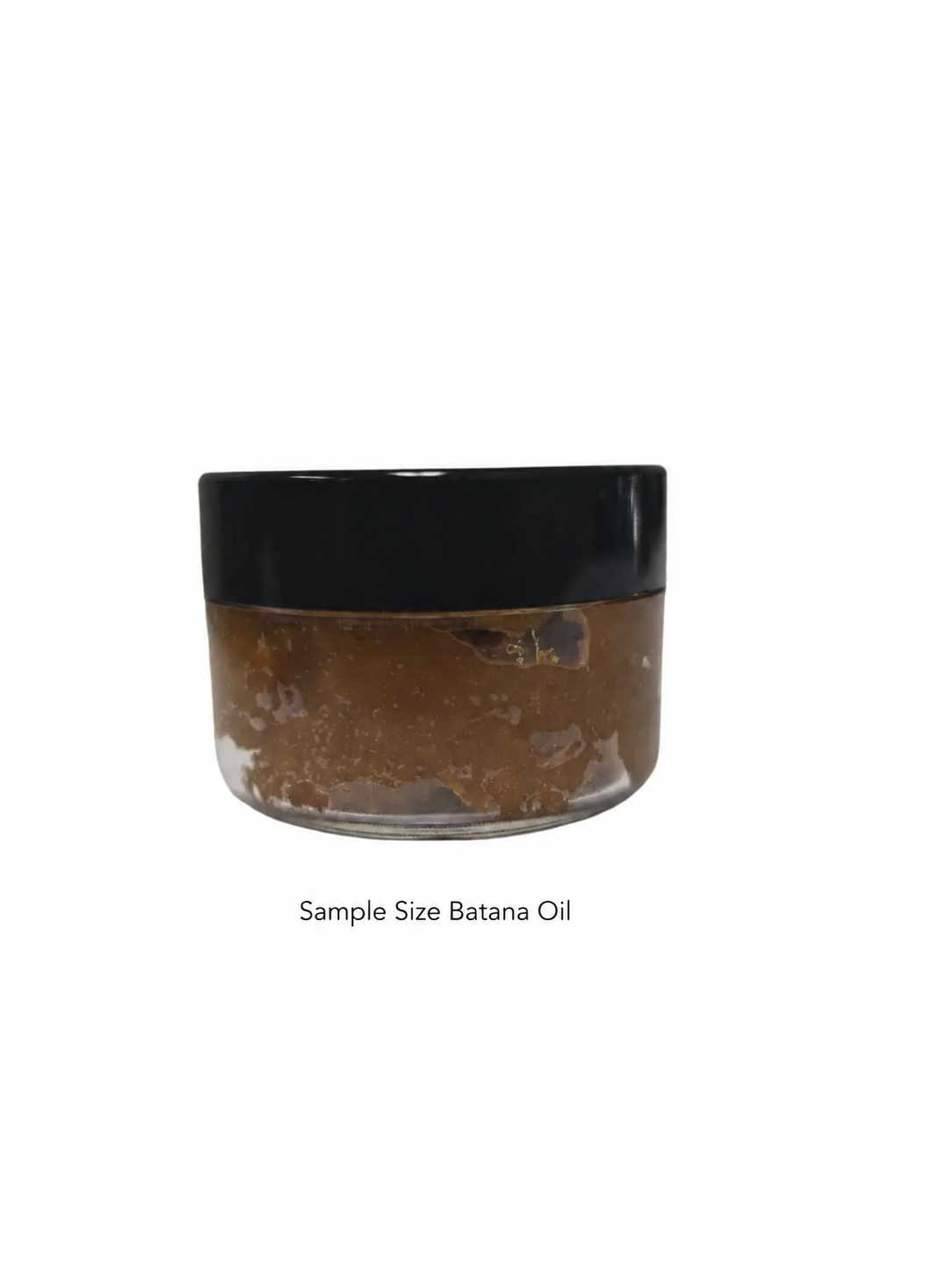 Sample size jar of authentic raw batana oil from Honduras for dry, damaged hair.