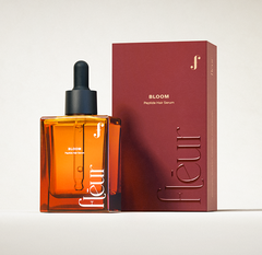 bloom peptide hair serum in elegant packaging and bottle